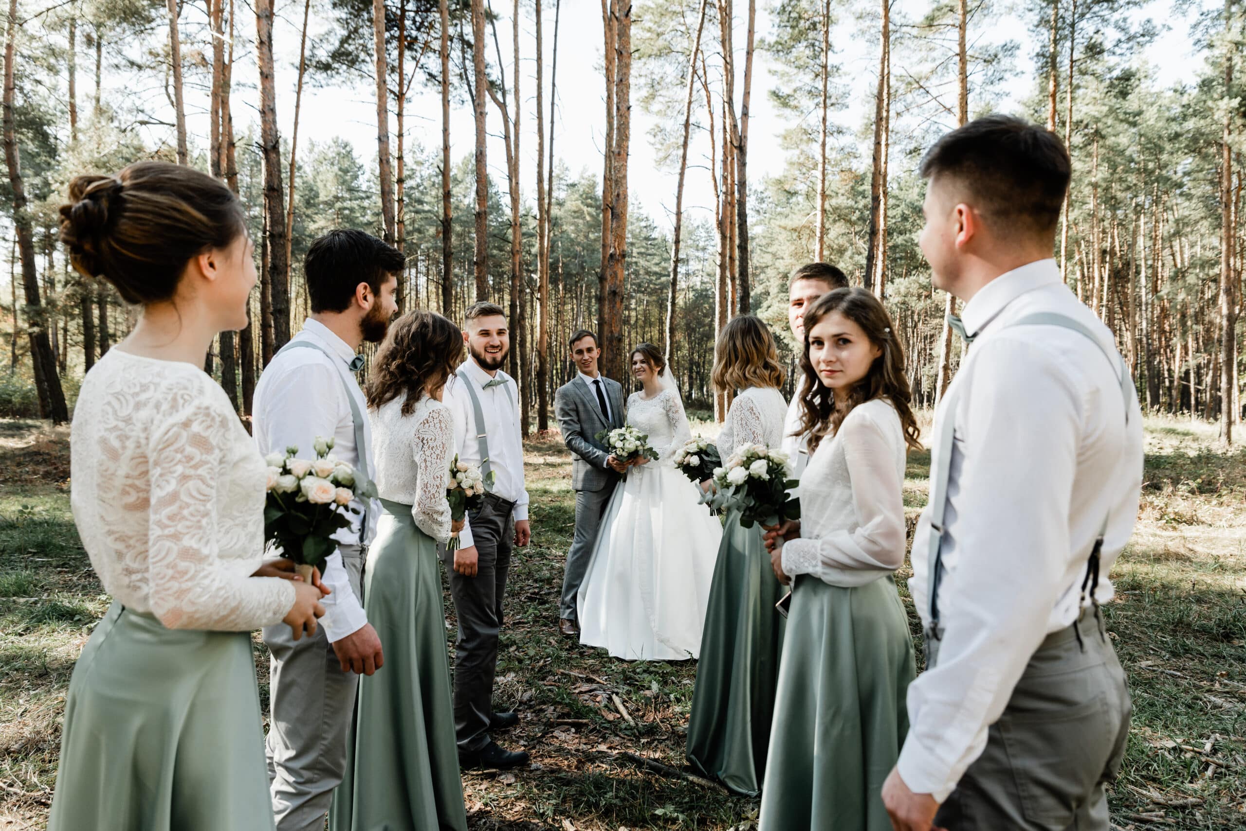 Silke Otte 3 bride groom their friends are having fun hugging scaled
